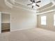 Large bedroom with neutral walls, carpet, and natural light at 2375 Morgan Farm Dr, Buford, GA 30519