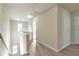 Upstairs hallway with light walls and hardwood floors at 2375 Morgan Farm Dr, Buford, GA 30519