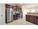 Kitchen with stainless steel appliances and wood cabinets at 2375 Morgan Farm Dr, Buford, GA 30519