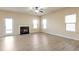 Spacious living room with fireplace and hardwood floors at 2375 Morgan Farm Dr, Buford, GA 30519