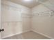 Ample walk-in closet with wire shelving for storage at 2375 Morgan Farm Dr, Buford, GA 30519