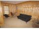 Finished basement with wood paneling and seating at 2920 Fleetwood Dr, Cumming, GA 30041