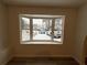 Bay window overlooking a snow-covered yard with parked cars visible at 4906 Holbrook Cir, Duluth, GA 30096