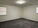 Spacious bedroom with ample natural light and new carpet at 4906 Holbrook Cir, Duluth, GA 30096