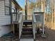 Wooden deck with stairs, railing, and a large planter at 4906 Holbrook Cir, Duluth, GA 30096