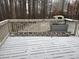 Wooden deck with snowy view, ladder and planter at 4906 Holbrook Cir, Duluth, GA 30096