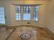 Dining area with tile floor and bay window at 4906 Holbrook Cir, Duluth, GA 30096