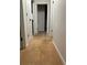 Hallway with light walls and tile flooring at 4906 Holbrook Cir, Duluth, GA 30096