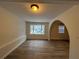 Bright living room with vinyl flooring and bay window at 4906 Holbrook Cir, Duluth, GA 30096