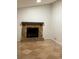 Living room with stone fireplace and tile flooring at 4906 Holbrook Cir, Duluth, GA 30096