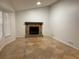 Living room with stone fireplace and tile flooring at 4906 Holbrook Cir, Duluth, GA 30096