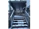 Wooden deck and stairs with gray railings covered in snow at 4906 Holbrook Cir, Duluth, GA 30096