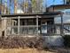 Covered porch with lattice details and wooden railings at 4906 Holbrook Cir, Duluth, GA 30096