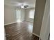 Spacious bedroom with hardwood floors and ceiling fan at 524 Jetal Nw Pl, Atlanta, GA 30318