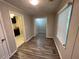 Simple dining room with hardwood floors and access to kitchen at 524 Jetal Nw Pl, Atlanta, GA 30318