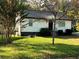 Cute ranch home with a well-maintained lawn at 524 Jetal Nw Pl, Atlanta, GA 30318