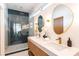 Spa-like bathroom with double vanity and walk-in shower at 2107 Abner Nw Pl, Atlanta, GA 30318