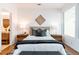 Bright bedroom with hardwood floors and large windows at 2107 Abner Nw Pl, Atlanta, GA 30318