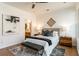 Modern bedroom featuring hardwood floors and ample natural light at 2107 Abner Nw Pl, Atlanta, GA 30318
