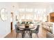 Bright dining area with a round table and four gray chairs at 2107 Abner Nw Pl, Atlanta, GA 30318