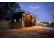 Modern house exterior at dusk, showcasing architectural details at 2107 Abner Nw Pl, Atlanta, GA 30318