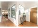 Light-filled hallway with built-in shelving and modern decor at 2107 Abner Nw Pl, Atlanta, GA 30318