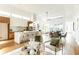 Modern kitchen with white cabinets and wood accents at 2107 Abner Nw Pl, Atlanta, GA 30318