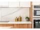 Clean lines and marble backsplash highlight this modern kitchen at 2107 Abner Nw Pl, Atlanta, GA 30318