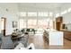 Open concept kitchen and dining area with hardwood floors and abundant natural light at 2107 Abner Nw Pl, Atlanta, GA 30318