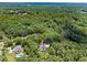 House nestled in a wooded area at 25 Highlands Way, Oxford, GA 30054