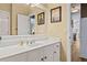 Clean bathroom with white vanity and mirror at 25 Highlands Way, Oxford, GA 30054