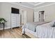 Spacious bedroom with light wood floors and ample natural light at 25 Highlands Way, Oxford, GA 30054