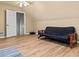 Bright bonus room featuring a futon at 25 Highlands Way, Oxford, GA 30054