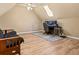 Spacious bonus room with a workspace and futon at 25 Highlands Way, Oxford, GA 30054