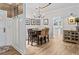 Charming dining room with a table and chairs, adjacent to the kitchen at 25 Highlands Way, Oxford, GA 30054