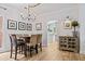 Farmhouse-style dining room with shiplap walls and chandelier at 25 Highlands Way, Oxford, GA 30054