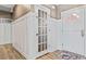 White-paneled entryway with interior door and exterior door at 25 Highlands Way, Oxford, GA 30054