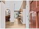 Bright entryway with hardwood floors and view to living room at 25 Highlands Way, Oxford, GA 30054