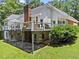 House with large deck and patio at 25 Highlands Way, Oxford, GA 30054