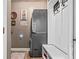 Convenient laundry room with washer, dryer, and built-in storage at 25 Highlands Way, Oxford, GA 30054