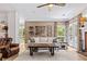 Spacious living room with hardwood floors, fireplace and comfy seating at 25 Highlands Way, Oxford, GA 30054