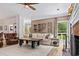 Living room with fireplace and access to backyard at 25 Highlands Way, Oxford, GA 30054