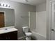 Simple bathroom with single vanity and tub at 5863 Seabright Ln, Atlanta, GA 30349