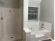 Bathroom with a separate shower and bathtub at 5863 Seabright Ln, Atlanta, GA 30349