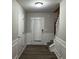 Spacious entryway with wood-look floors and neutral paint at 5863 Seabright Ln, Atlanta, GA 30349