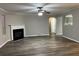 Large living room with fireplace and neutral color scheme at 5863 Seabright Ln, Atlanta, GA 30349