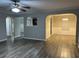 Open living and dining area with neutral colors and wood floors at 5863 Seabright Ln, Atlanta, GA 30349