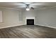 Living Room with wood-look floors and a corner fireplace at 5863 Seabright Ln, Atlanta, GA 30349