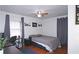 Bedroom with hardwood floors, a desk, and ample closet space at 692 Argonne Ne Ave # 2, Atlanta, GA 30308