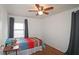 Bright bedroom with hardwood floors and a ceiling fan at 692 Argonne Ne Ave # 2, Atlanta, GA 30308